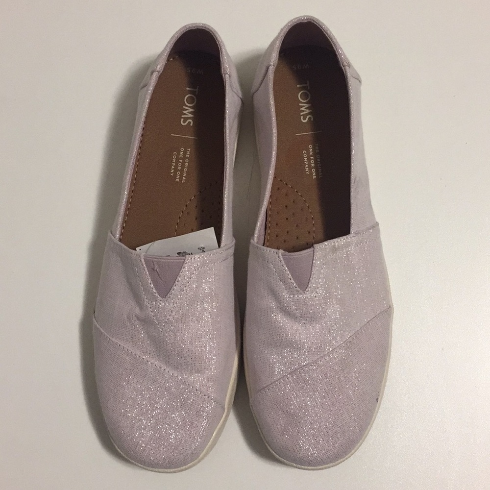 Brand new Toms size US 9.5